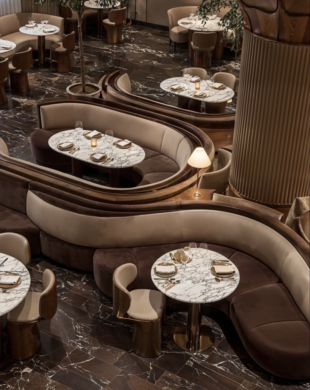 Canopy — booths curving in velvet and brass