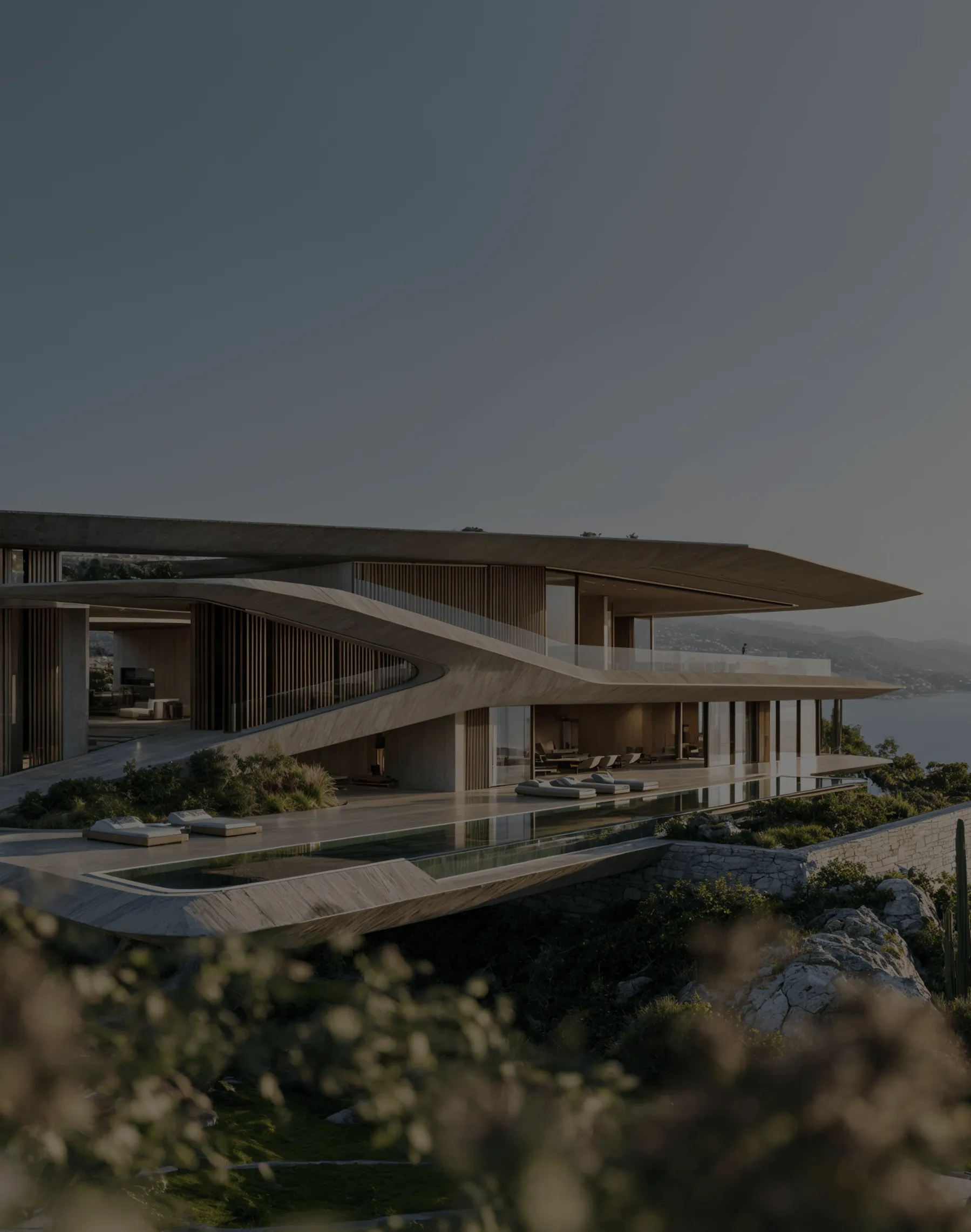 Tulia — timber-canopied terraces and an infinity pool cantilevered over the forest at dusk